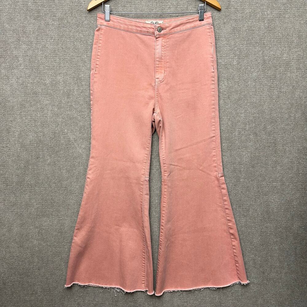 We The Free People Pull On Flare Jeans Faded Orange Bell Bottom Raw Hem Size 29